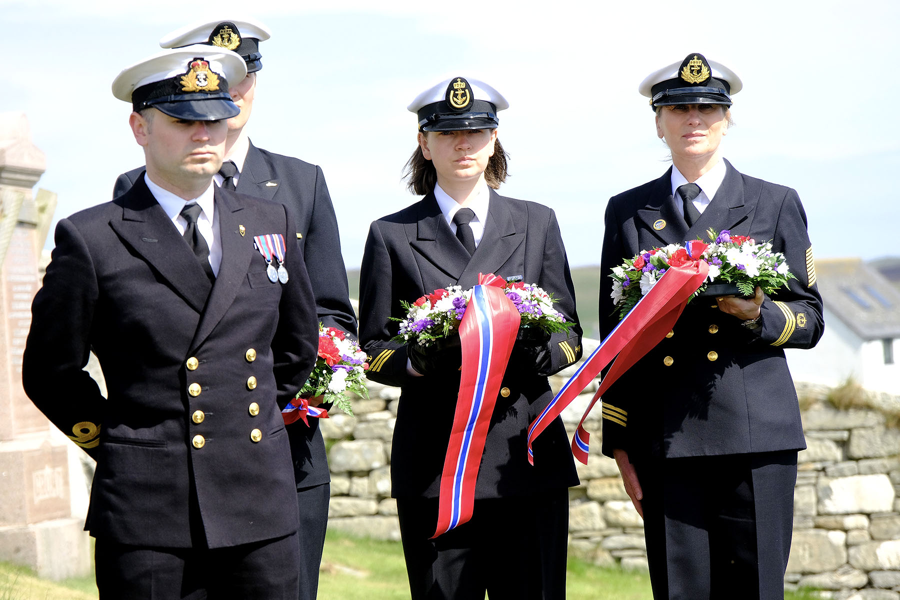 Laying wreaths on War Graves in Lerwick